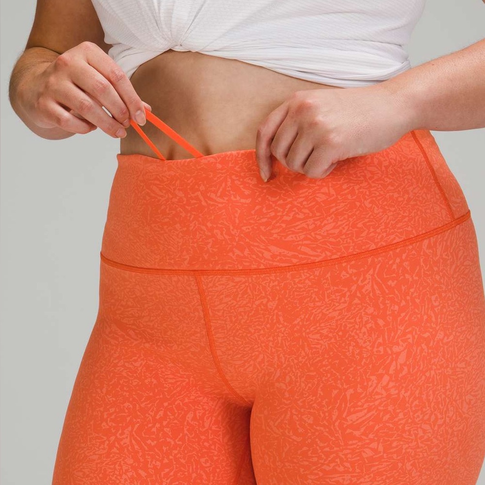 EUC Lululemon Wunder Train HR Shorts 6” Size 10 Crunch Warm Coral Orange - Picture 9 of 9